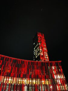 Tower of the national stadium in Tirana, Albania, lit in red at night