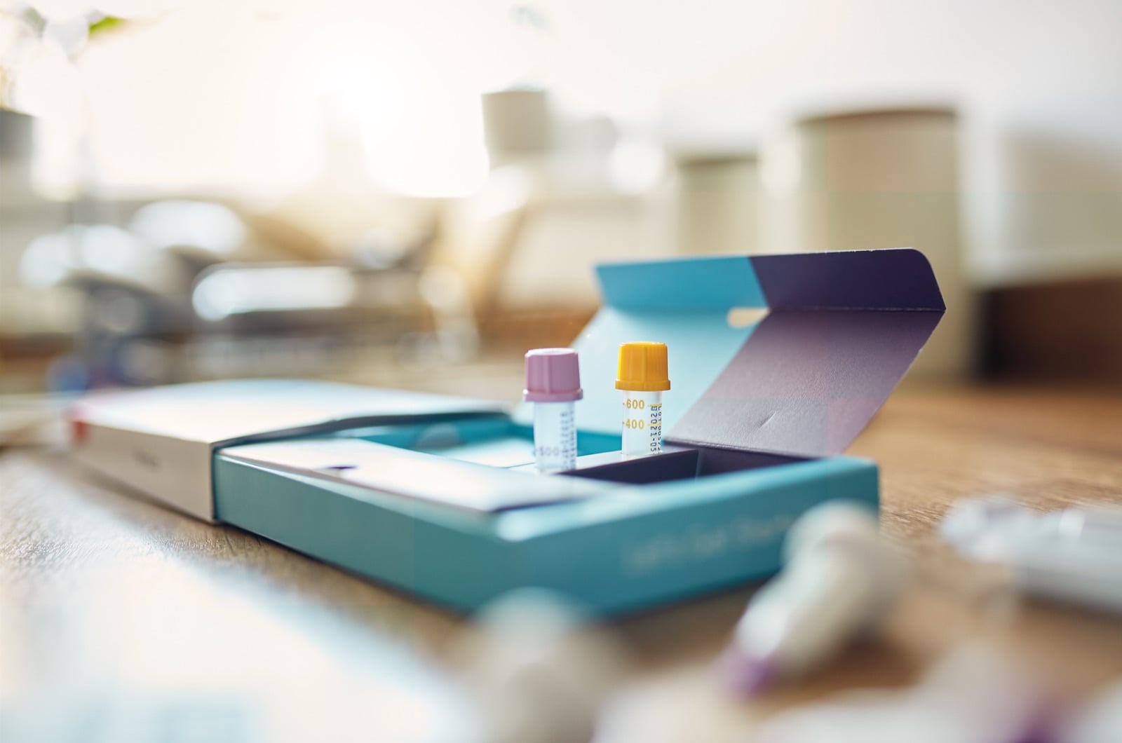 DNA testing kit on a wooden table