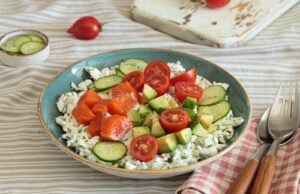 Bowl of tomato, cucumber and white cheese salad, the style of the Albanian village salad