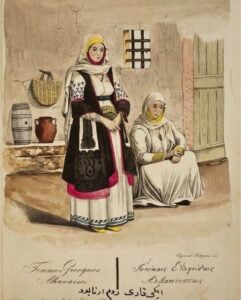 Historical hand-colored illustration of two Arvanite women in traditional dress in Attica, captioned in French, Greek and Ottoman Turkish