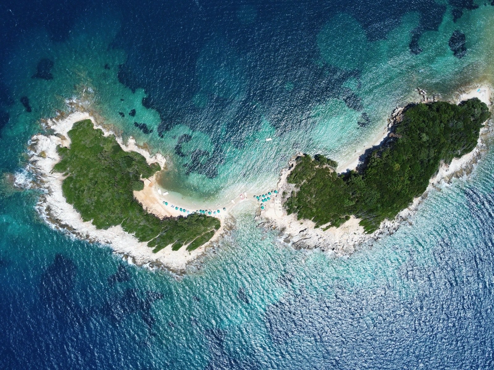 Aerial view of the Ksamil islands and turquoise water on the Albanian Riviera