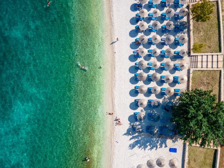 Aerial view of a beach with turquoise water
