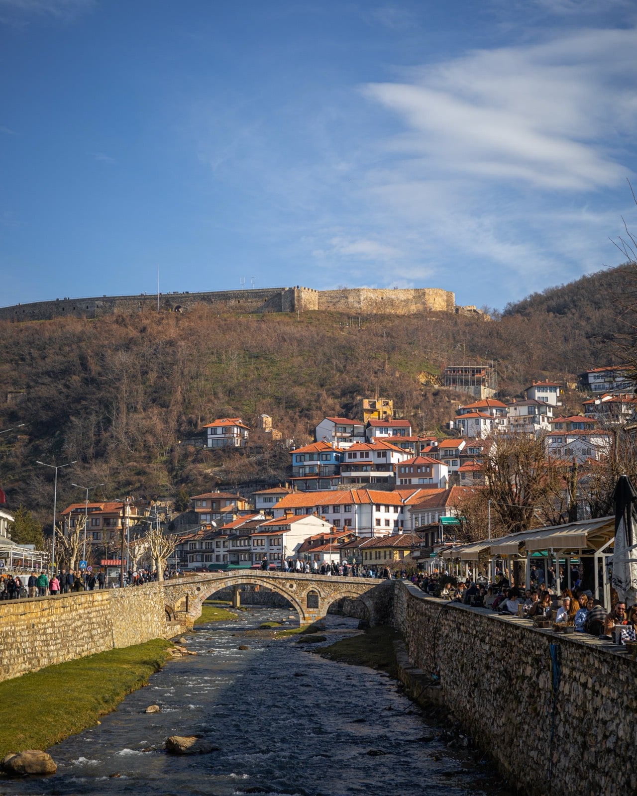 Old town with a river and a stone bridge, the setting of the 1878 League of Prizren