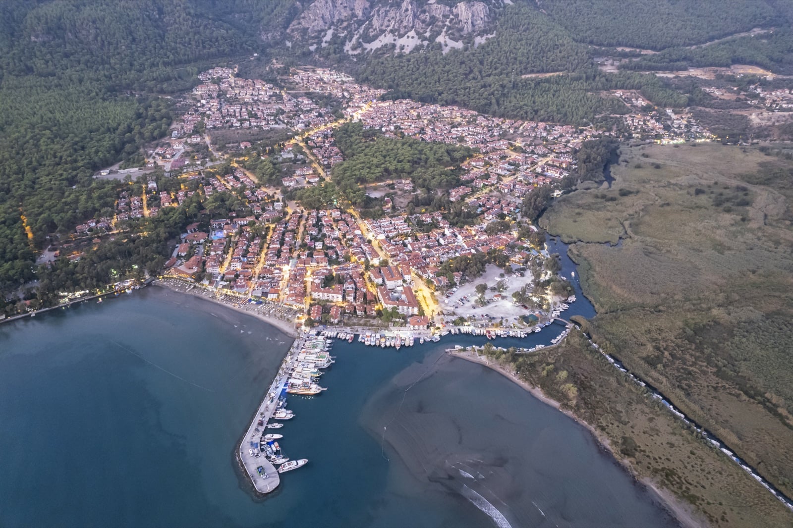 Aerial view of a coastal town at sunset